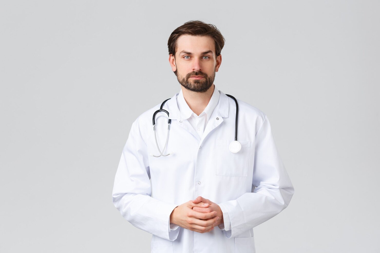hospital-healthcare-workers-covid-19-treatment-concept-young-doctor-scrubs-making-daily-errands-clinic-listening-patient-symptoms-look-camera-professional-physician-curing-diseases_1258-57233